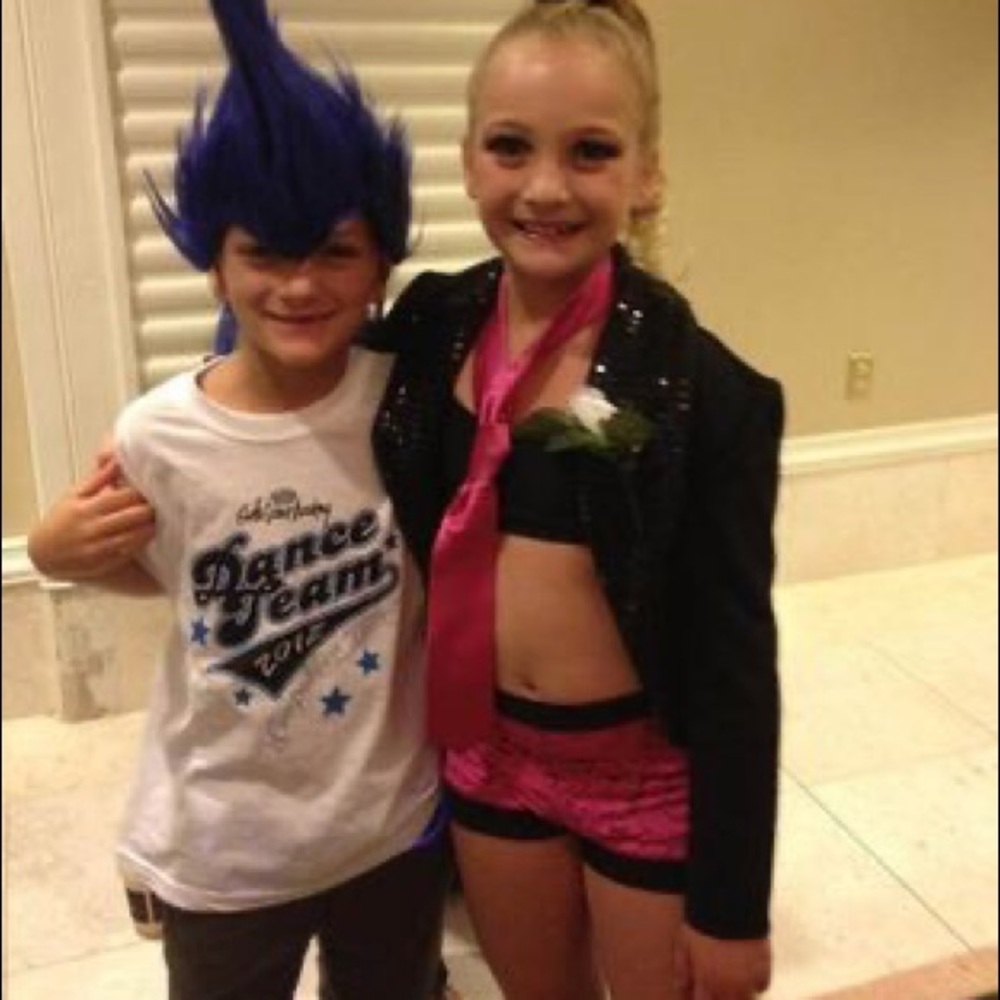 Child’s Size Medium Sparkled and sequined Tuxedo jacket. Excellent condition.